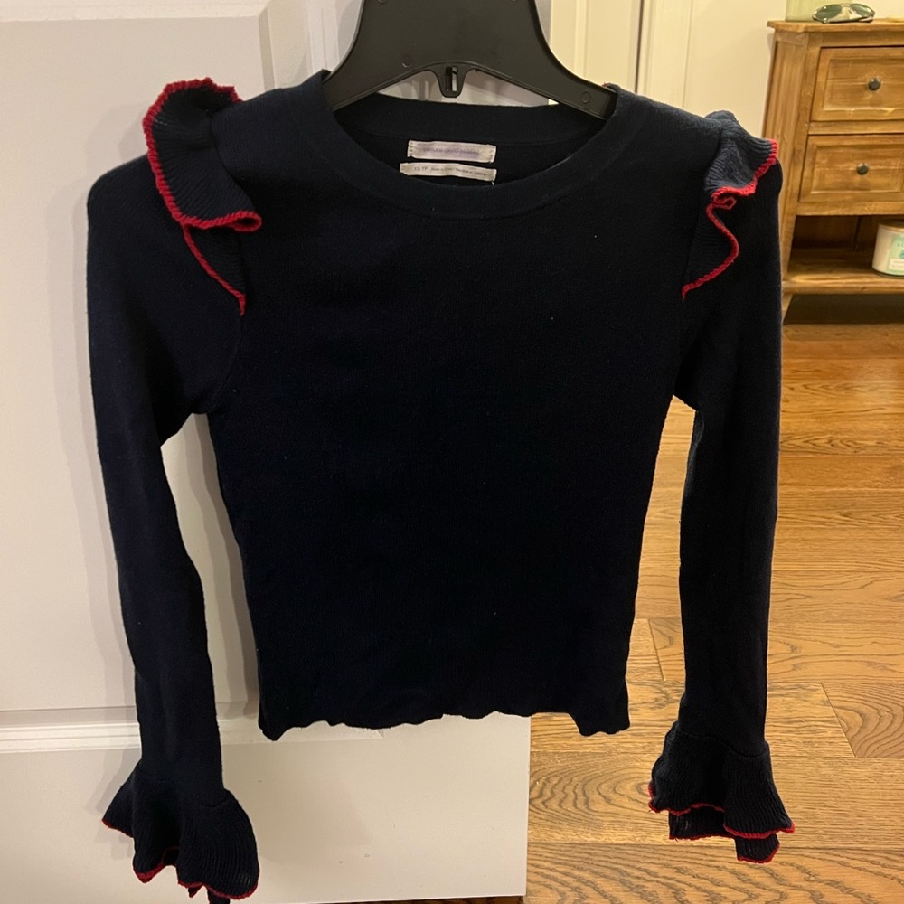 Navy fitted sweater with ruffles at shoulder!
